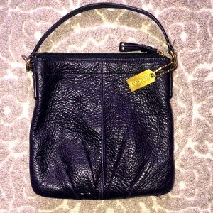 Gorgeous Plum color pebble leather Coach handbag.